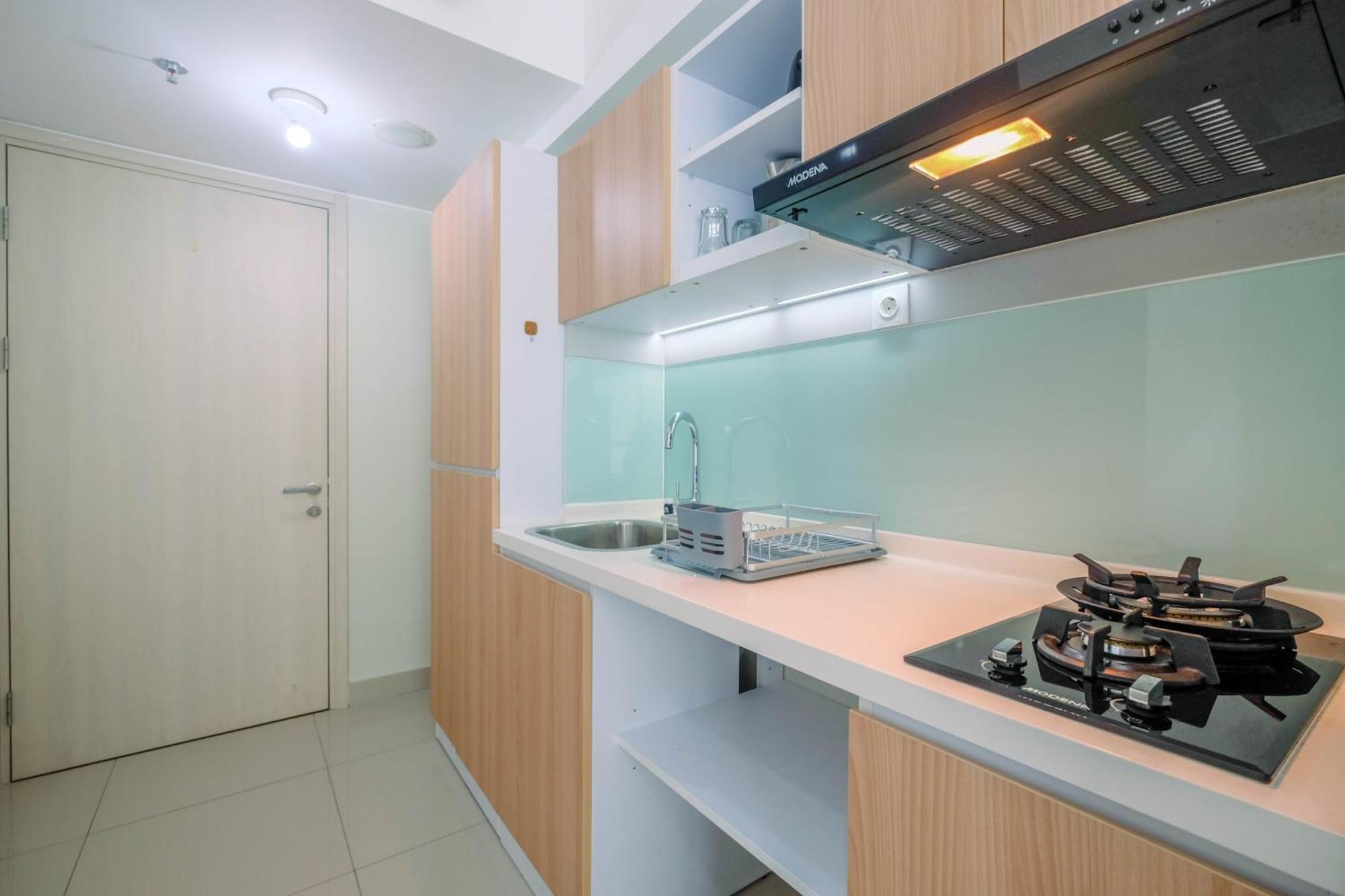 Functional And Minimalist At Springlake Summarecon By Travelio Apartemen Bekasi